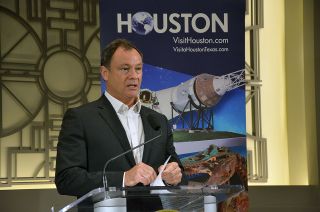 Association of Space Explorers-USA president and former NASA astronaut Michael Lopez-Alegria speaks at the press conference announcing Houston as the host city for the 32nd Planetary Congress at Houston City Hall on July 20, 2016.