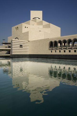 body of water, Museum of Islamic Art, Doha, in background