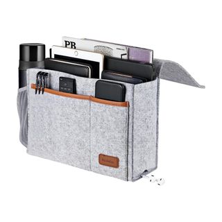 A gray over bed storage caddy