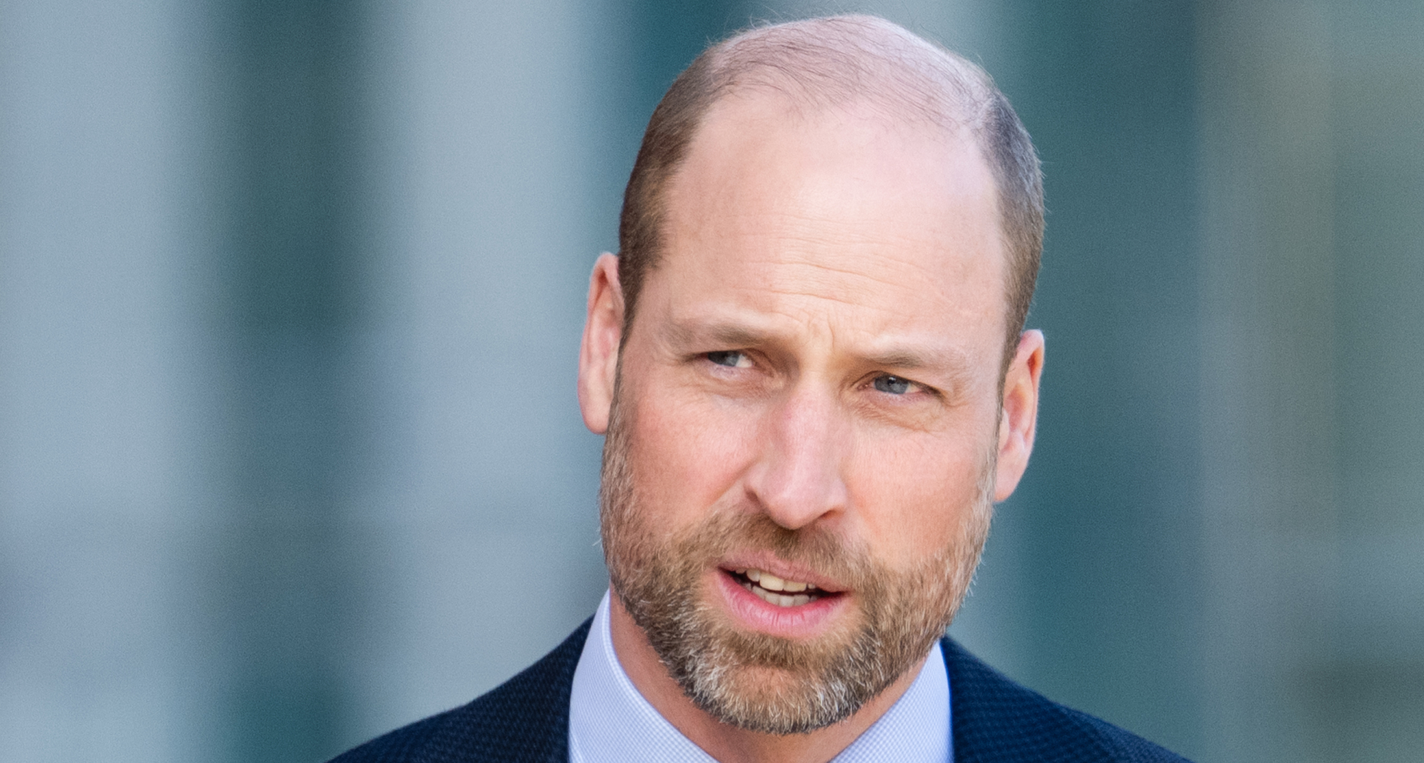 Prince William wearing a blue suit 