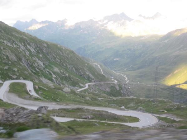 A sick road descent down the east side of Neufenen Pass