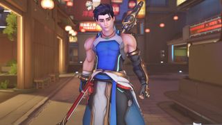 Overwatch 2 Wuyang: The new hero Wuyang standing with his arms by his side, with his right arm slightly behind his back holding his staff.