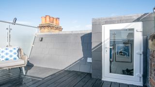 Roof terrace with white framed door