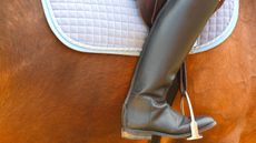 Rider wearing wide riding boots