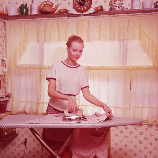 woman with iron and iron table