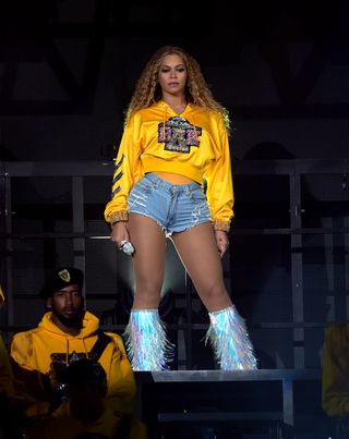 Best Coachella Fashion Looks | Beyonce Knowles performs onstage during 2018 Coachella Valley Music And Arts Festival Weekend 1 at the Empire Polo Field on April 14, 2018 in Indio, California.
