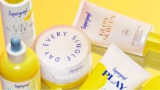 Supergoop sunscreens on a yellow background