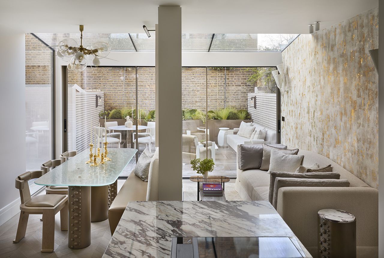 open plan dining and living room with a white sofa