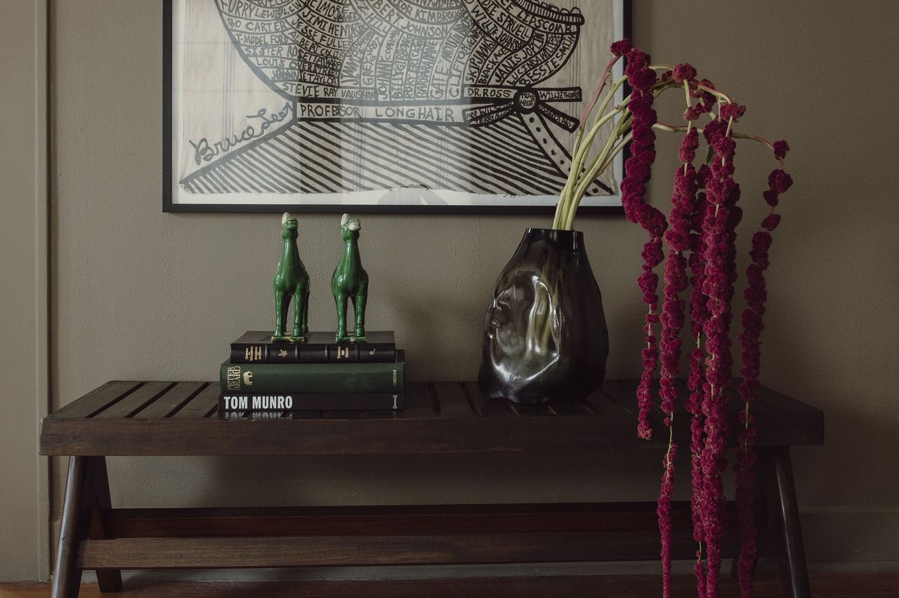 A bedroom with brown paint