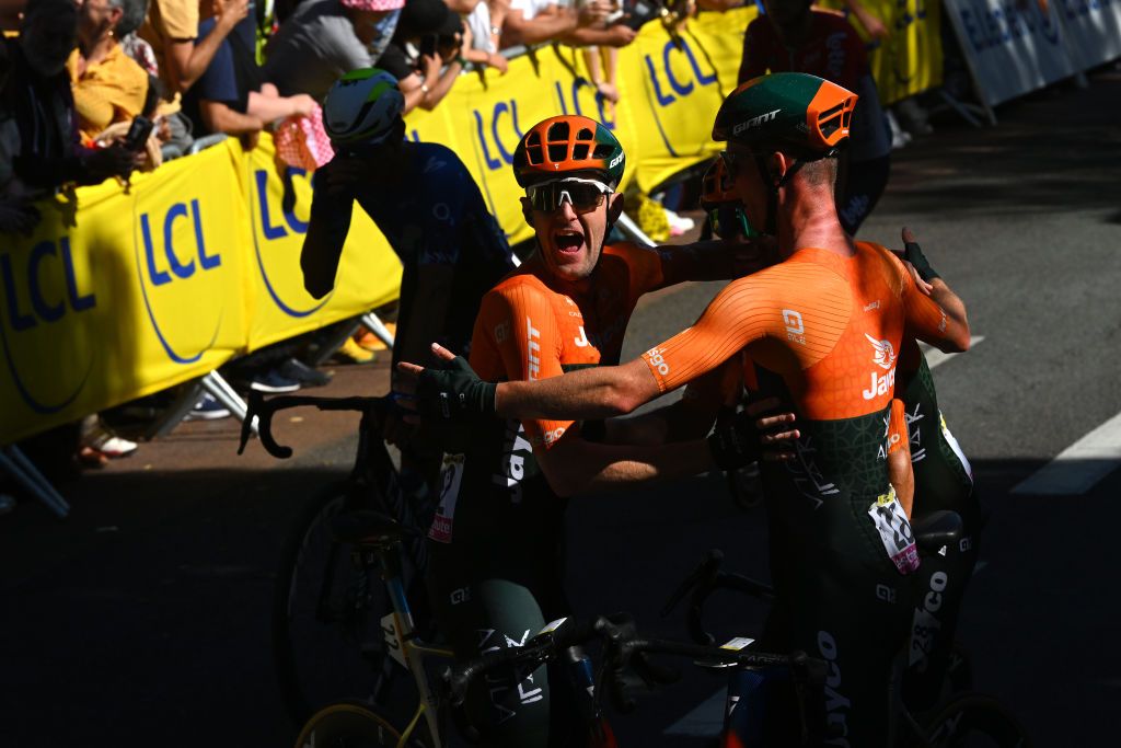 DIJON FRANCE JULY 04 LR Luke Durbridge of Australia and Elmar Reinders of Netherlands and Team Jayco AlUla celebrate the victory of his teammate Dylan Groenewegen of Netherlands at the finish line during the 111th Tour de France 2024 Stage 6 a 1635km stage from Macon to Dijon UCIWT on July 04 2024 in Dijon France Photo by Dario BelingheriGetty Images