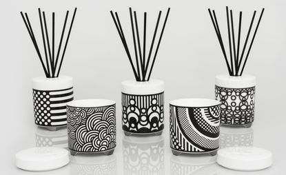 Five black and white pots and incense holders with bold patterns 