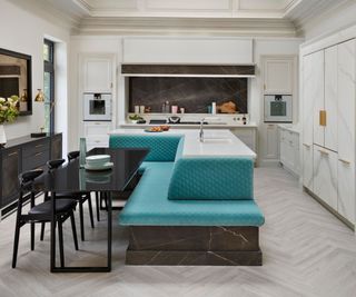 Kitchen island with banquette and dining table
