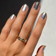 @betina_goldstein silver nail design