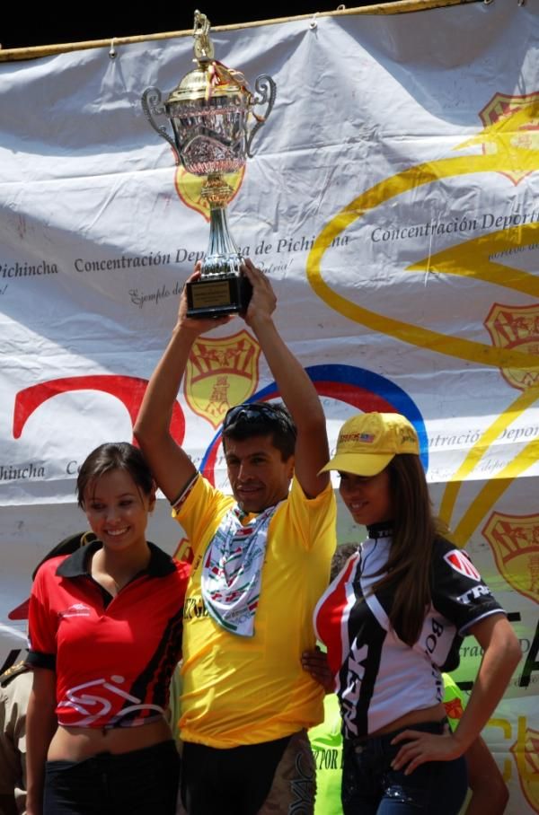 Camargo hoists the trophy for the overall win
