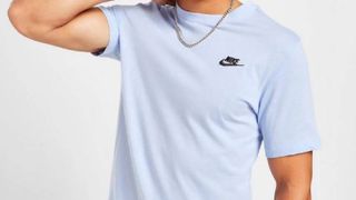 Men's pale blue t-shirt with Nike logo on right-hand side. T-shirt stocked at JD Sports