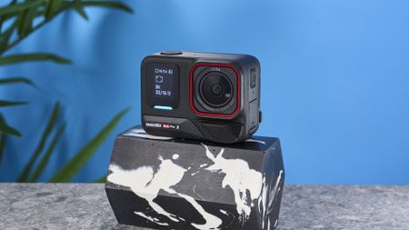 The Insta360 Ace Pro 2 against a blue background