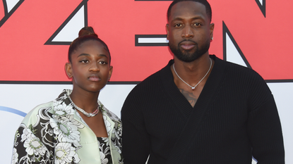 Zaya Wade and father Dwyane Wade at the 'Cheaper By The Dozen' premiere held at El Capitan Theatre on March 16th, 2022 in Los Angeles, California.