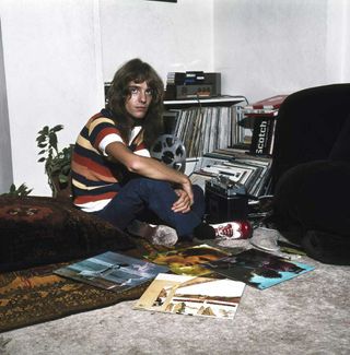 Peter Frampton at home with his record collection