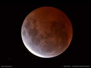 This spectacular view of the red moon during the April 4, 2015 total lunar eclipse by photographer Dean Hooper in Melbourne, Australia. This image was shared by the Virtual Telescope Project in Italy.