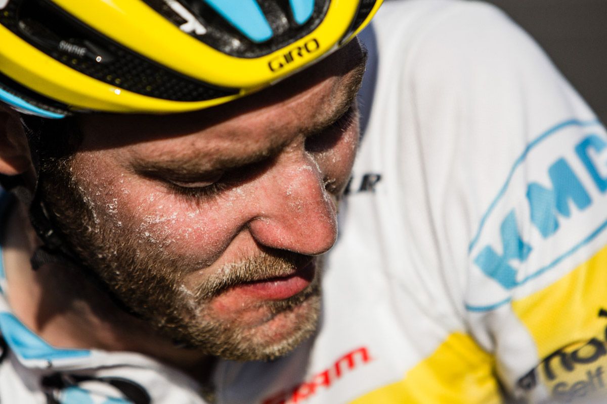 Travis Liverman (SmartStop) shows the heat of the day after the finish.