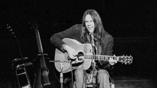 Neil Young performs at the Royal Festival Hall, London in 1971