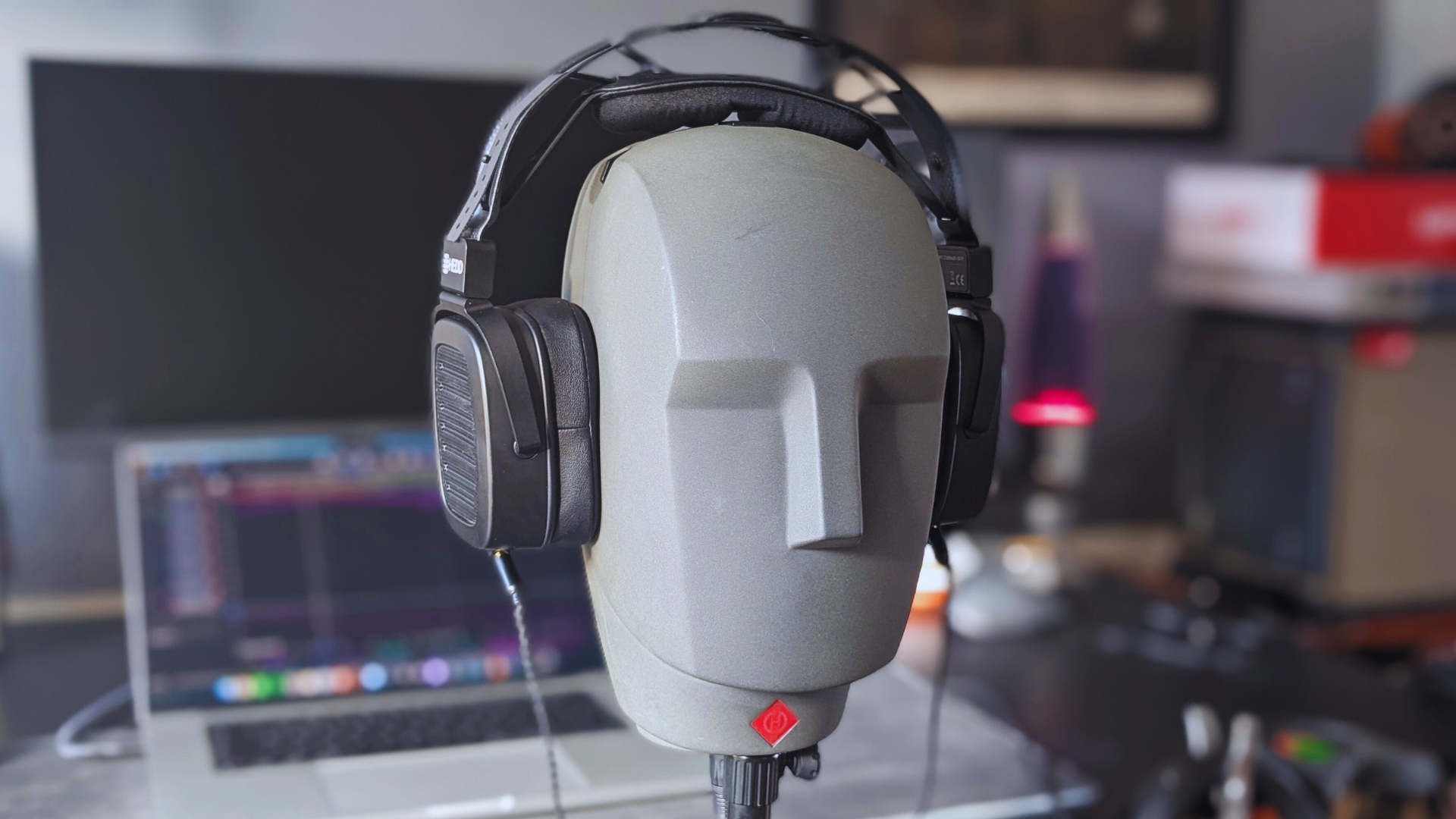 A pair of Hedd Heddphone Two studio headphones on a Neumann dummy head