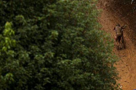 A rider battles overwhelmingly muddy conditions