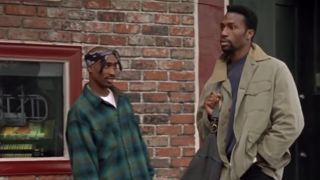 Tupac talking to Leon on a sidewalk in Above The Rim