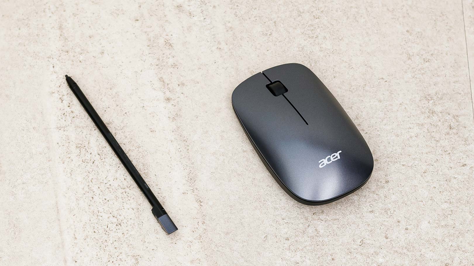 Acer Chromebook Spin 714 mouse and stylus laid out on a desk