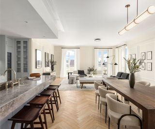 Open plan kitchen dining and living room, wooden floors