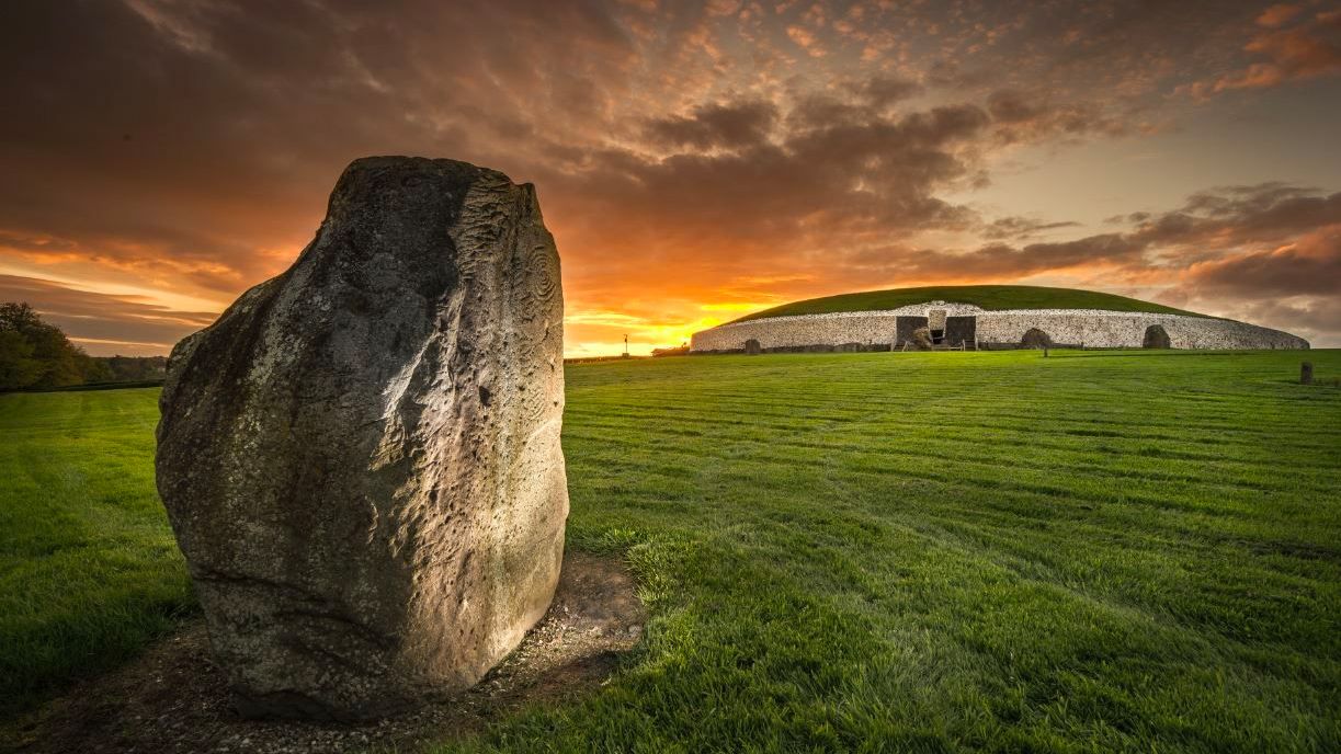 The circular Newgrange passage tomb on a misty morning in Ireland's Boyne Valley. Scientists say it contained the bones of a Neolithic man, probably a king whose parents were brother and sister.