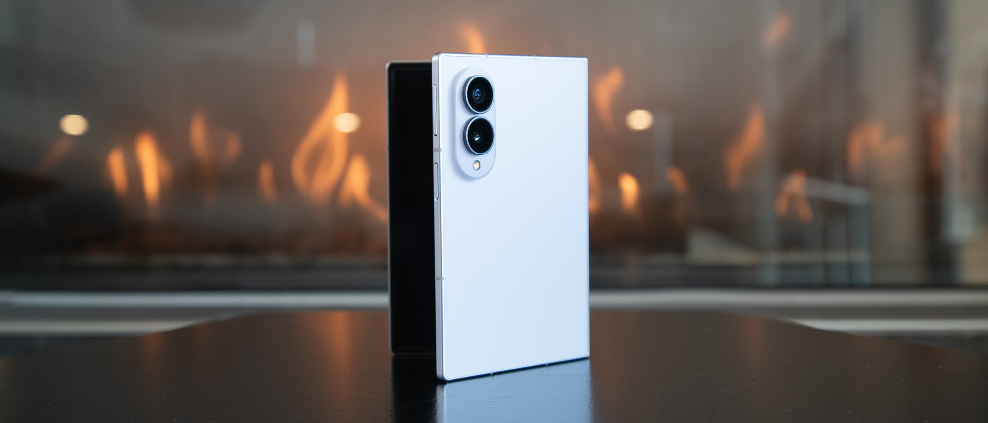 Galaxy Z Fold 8 in front of a fireplace