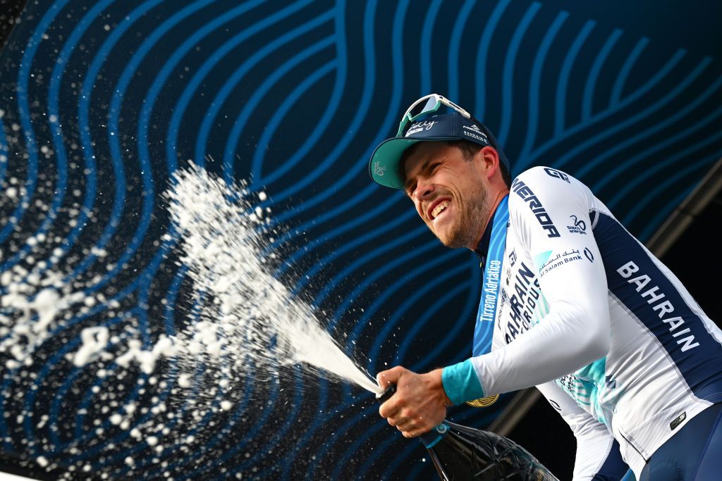 GUALDO TADINO ITALY MARCH 06 Phil Bauhaus of Germany and Team Bahrain Victorious celebrates at podium as stage winner during the 59th TirrenoAdriatico 2024 Stage 3 a 225km stage from Volterra to Gualdo Tadino 527m UCIWT on March 06 2024 in Gualdo Tadino Italy Photo by Tim de WaeleGetty Images
