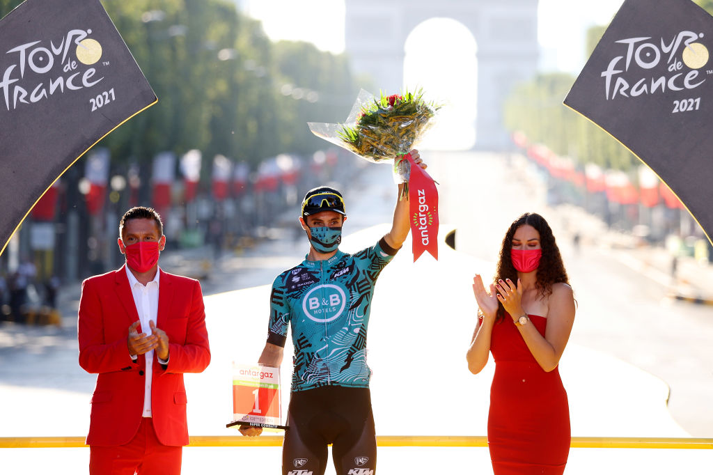 Franck Bonnamour (B&B Hotels) celebrates winning the combativity prize on the final podium of the 2021 Tour de France