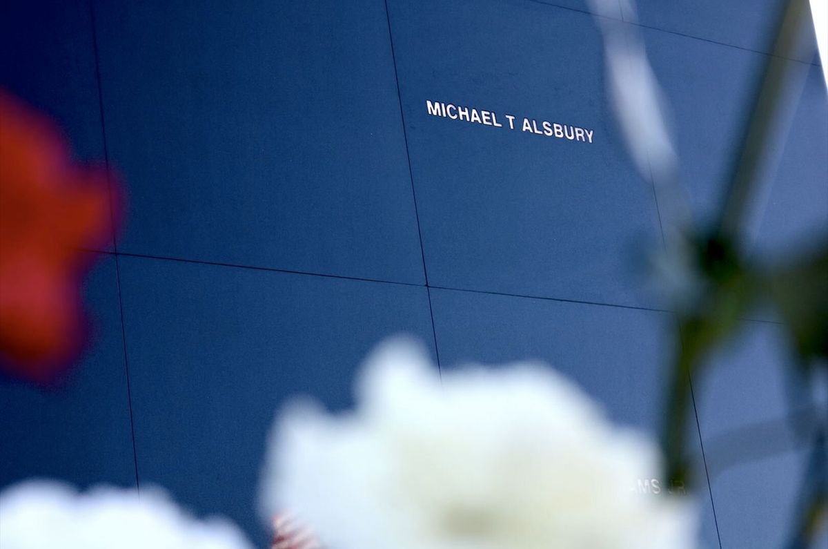 Fallen SpaceShipTwo pilot Michael Alsbury&#039;s name glows with light projected from behind the Space Mirror Memorial at NASA&#039;s Kennedy Space Center Visitor Complex in Florida. A ceremony was held on Saturday, Jan. 25, 2020 to reveal the addition to the national monument.