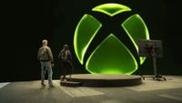 Xbox's Asha Sharma and Matt Booty oversee the new Xbox logo