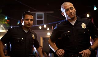 End Of Watch Michael Peña and Jake Gyllenhaal arrive on the scene of a crime