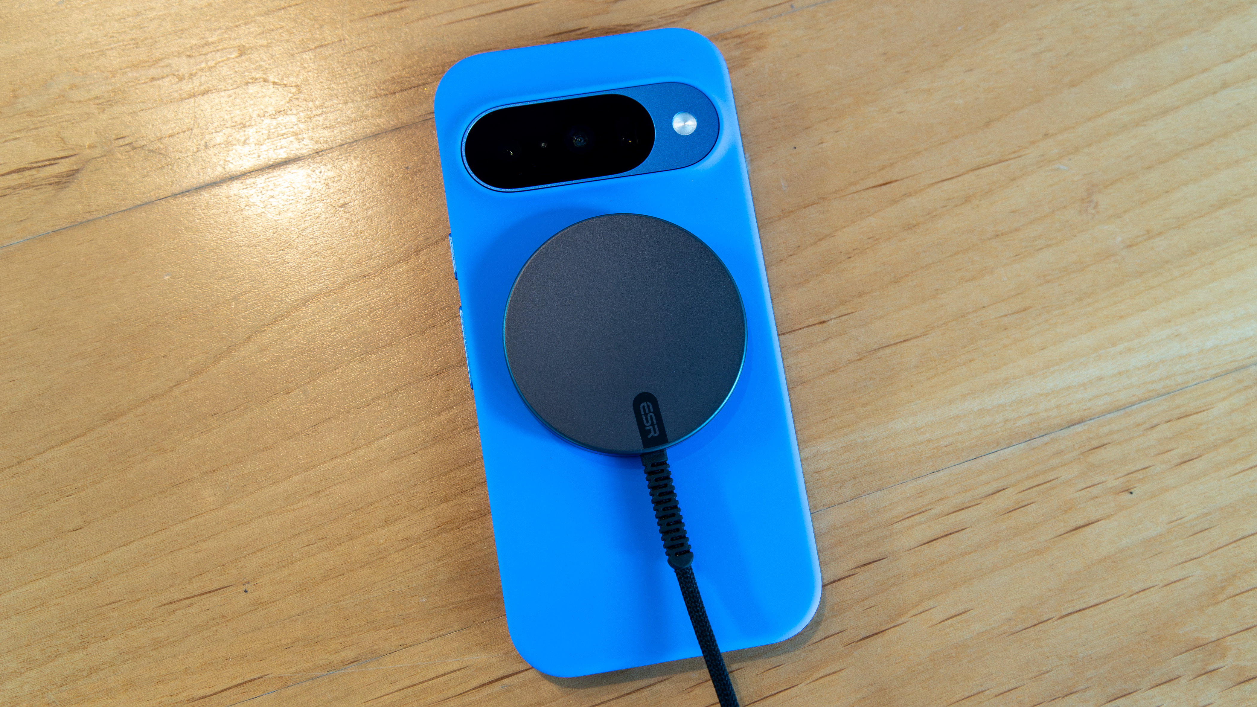 Pixel 10 with an ESR Qi2 charger