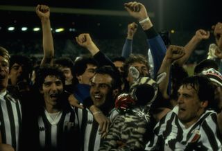 Juventus players celebrate after beating Liverpool to win the 1985 European Cup final, which was marred by crowd trouble as 39 fans lost their lives.