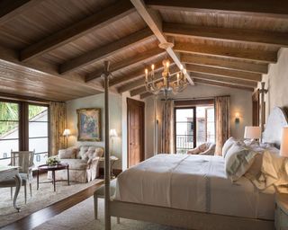 Rustic-country style bedroom with warm wood exposed beams