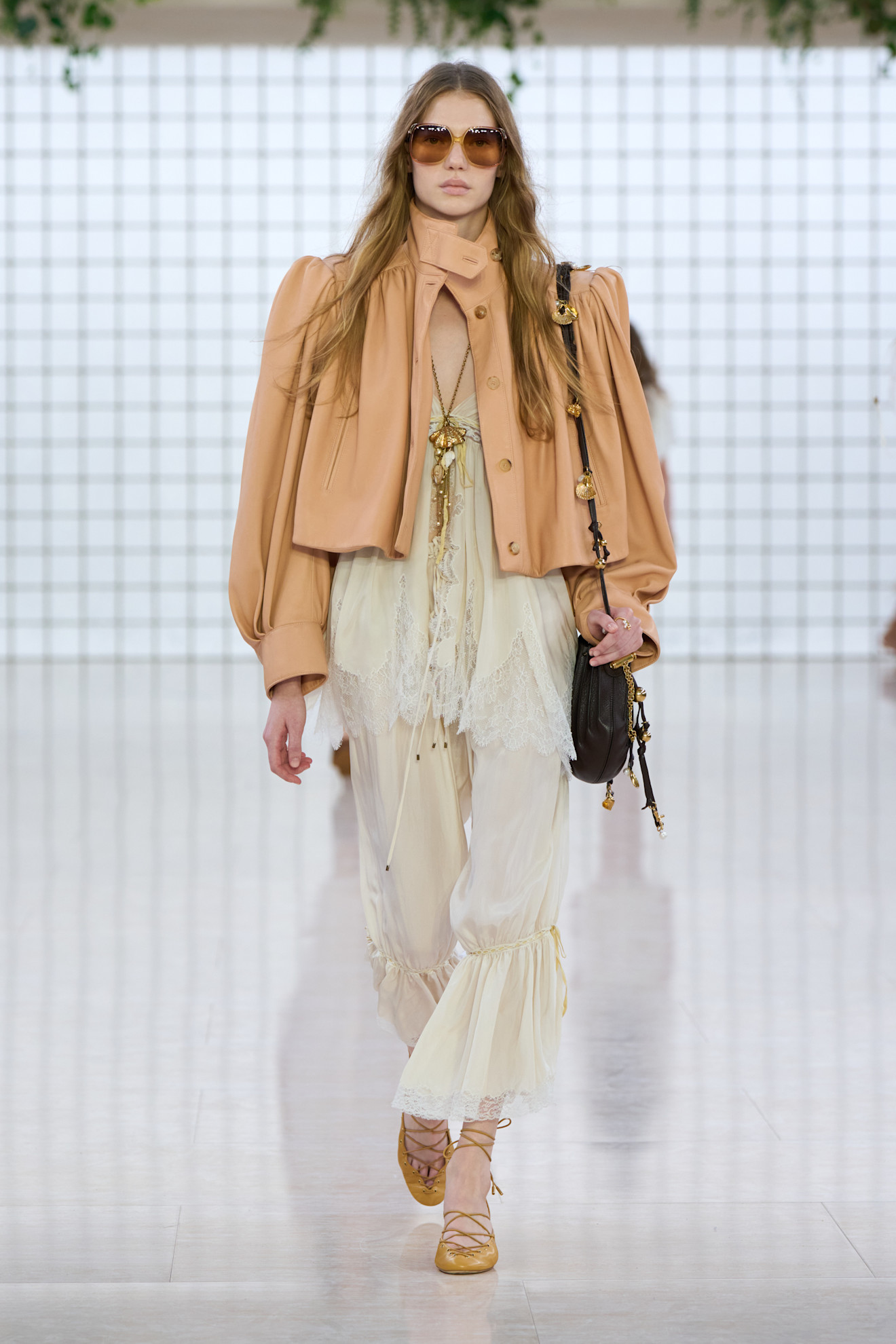 An image of lace-up flats as seen on Chloé's spring/summer 2025.