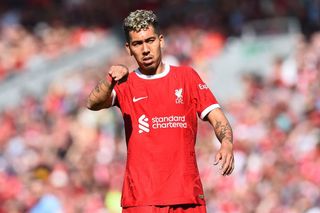 Liverpool's Brazilian striker Roberto Firmino reacts during the English Premier League football match between Liverpool and Aston Villa at Anfield in Liverpool, north west England on May 20, 2023.