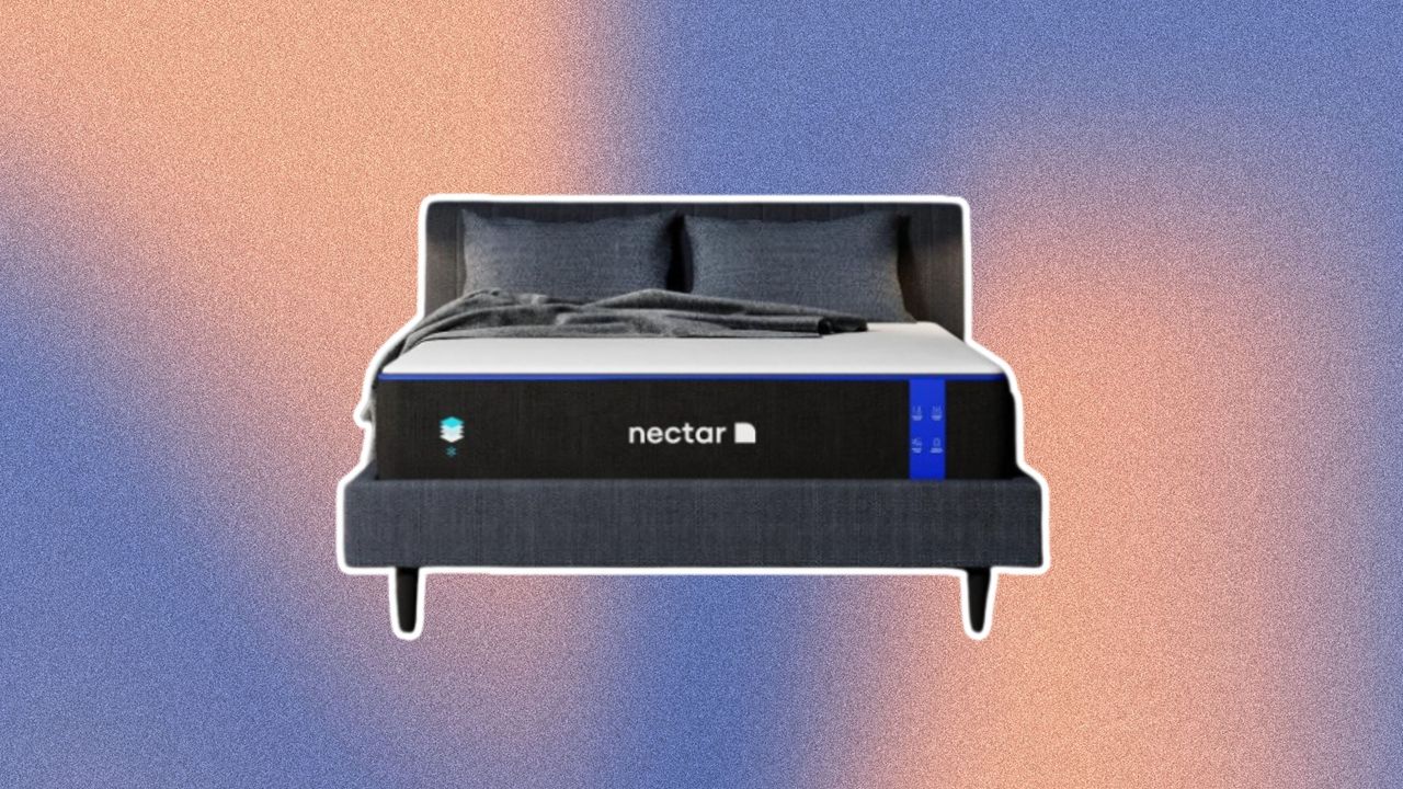 The Prime Day Nectar mattress deal is a steal. Here is a black bed with the mattress on it and two gray pillows on top of it