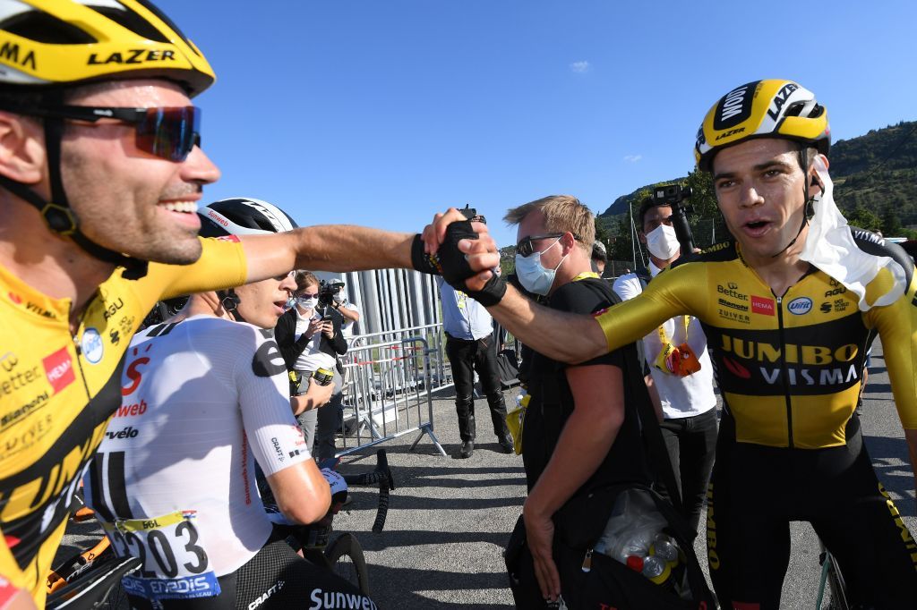 Team Jumbo rider Belgiums Wout van Aert R celebrates with Team Jumbo rider Netherlands Tom Dumoulin after winning the 5th stage of the 107th edition of the Tour de France cycling race 185 km between Gap and Privas on September 2 2020 Photo by Stephane MANTEY various sources AFP Photo by STEPHANE MANTEYAFP via Getty Images