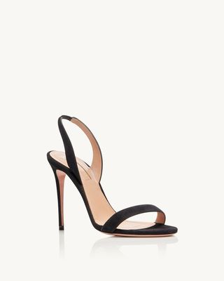 high heel black sandals with one strap at the toe and a slingback strap at the back