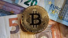 Bitcoin on euro notes © NurPhoto/NurPhoto via Getty Images