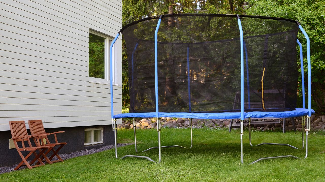 large trampoline in backyard