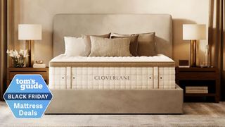 The Cloverlane Hybrid mattress on a bed in a well-lit spacious bedframe