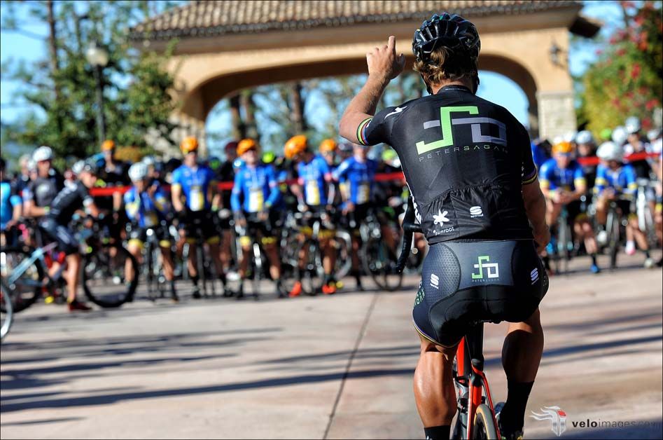 Peter Sagan shows off his wheelie skills