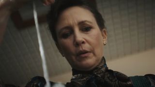 Vera Farmiga as Lorraine Warren looking concerned in The Conjuring: Last Rites